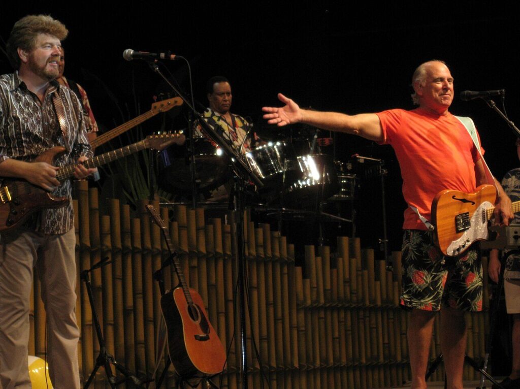 Jimmy Buffett performing on stage