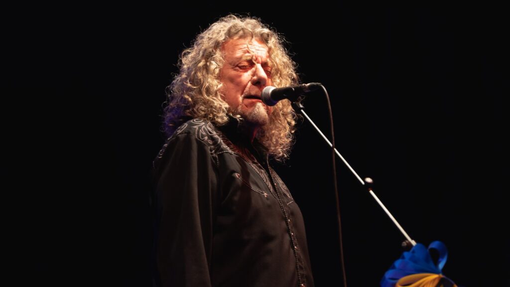 Robert Plant performing on stage in 2022